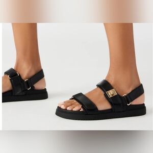 Steve Madden Mona Black Sandals with Gold Buckles